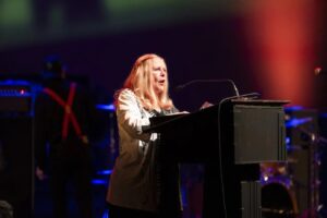 Carol Dillabough accepts the SAMMY award. Photo courtesy Syracuse Area Music Awards. 